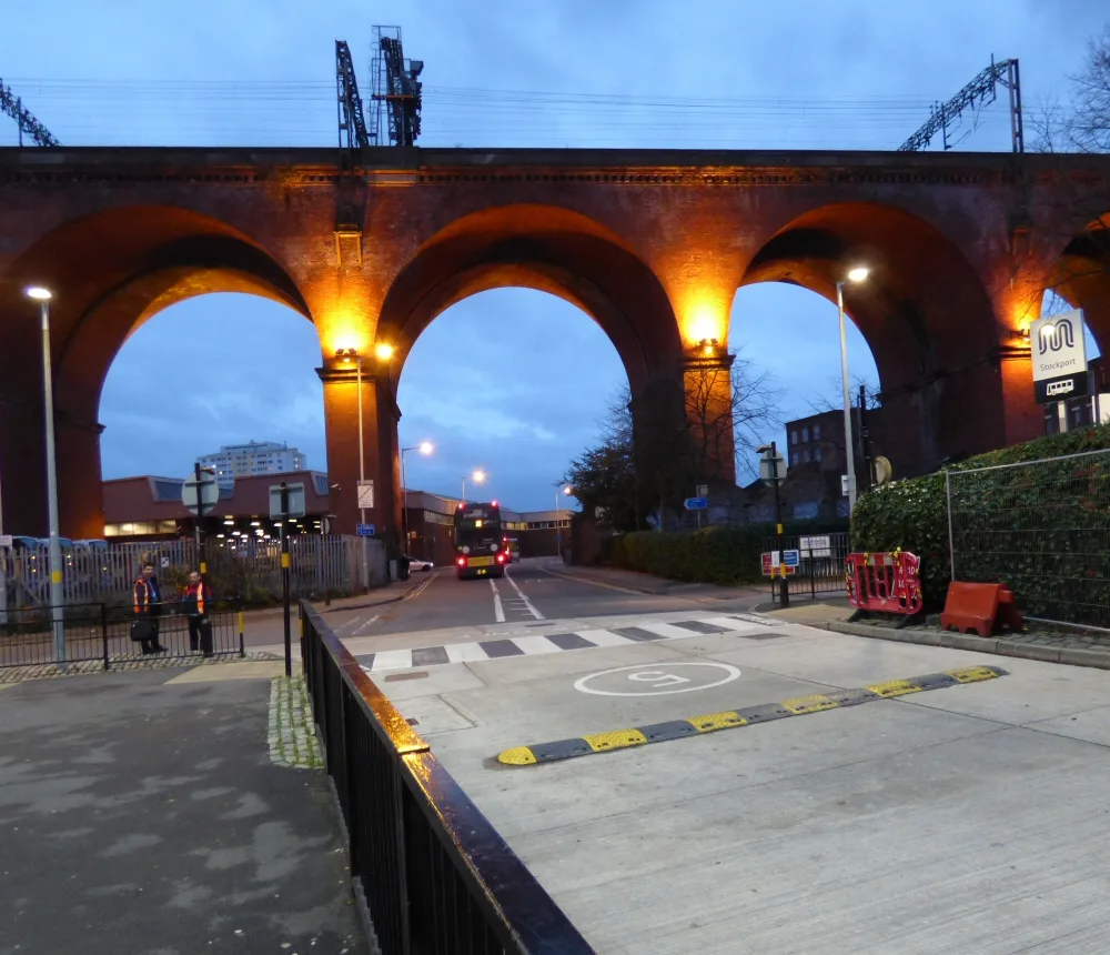 A bus on Chestergate heading back towards the depot under Stockport Viaduct, photographed in 2015
